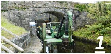 Working beneath a historic arch