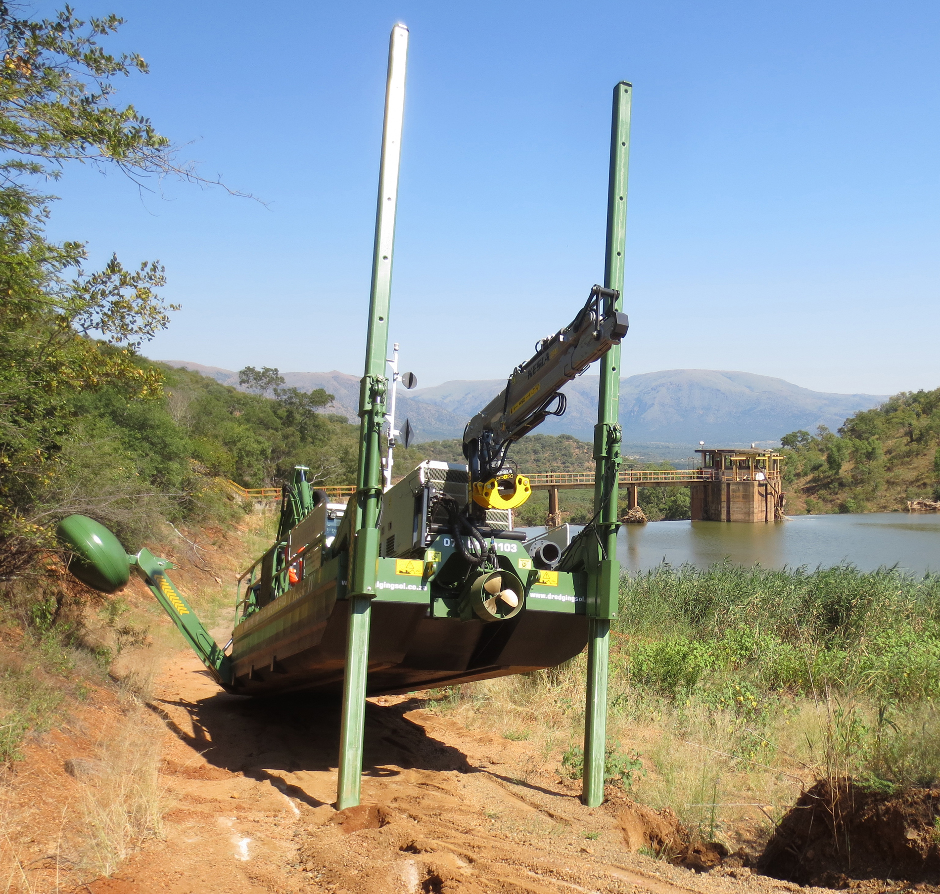 Amphibious Watermaster dredger on its way to desilt a dam